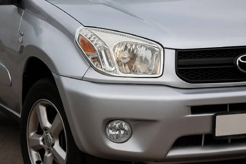 Накладки на фари (2 шт., пласт) 2003-2006 Toyota Rav 4 2001-2005 рр.