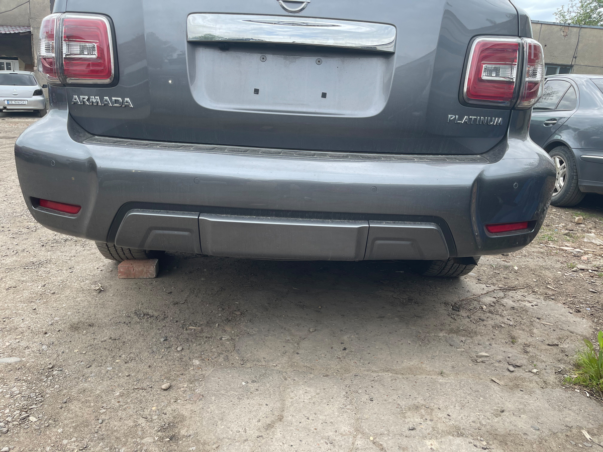 Задній бампер в зборі (оригінал 2019 рік) для Nissan Armada 2016-2024 рр